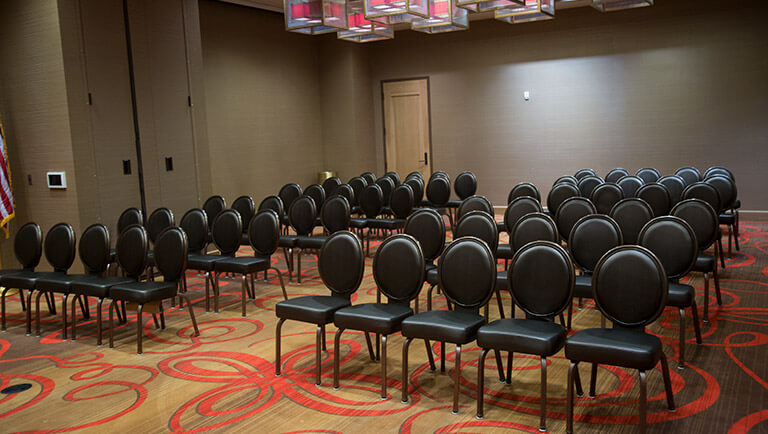 rows of setup for an event in the atasi room