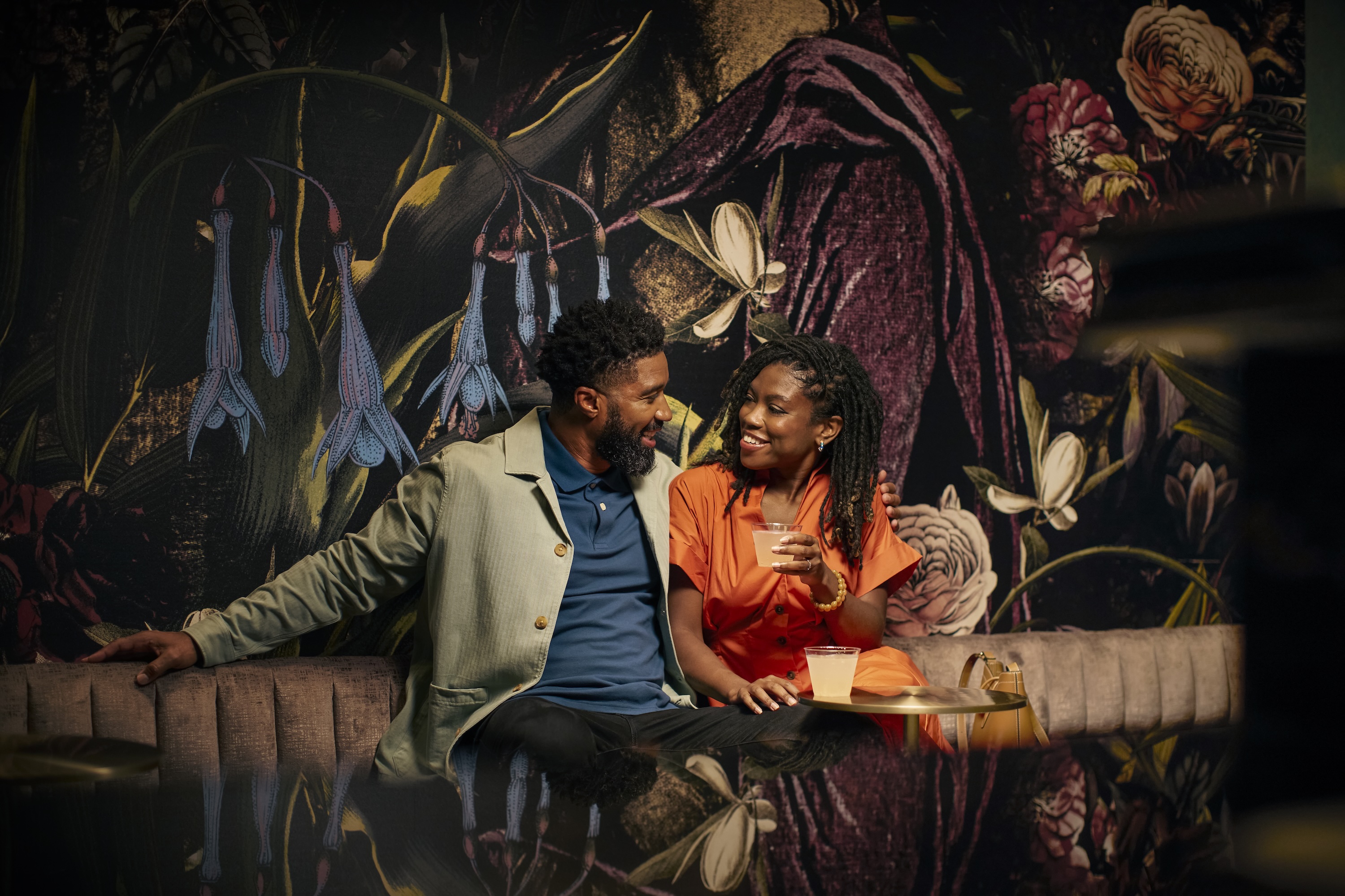 A couple enjoying drinks.