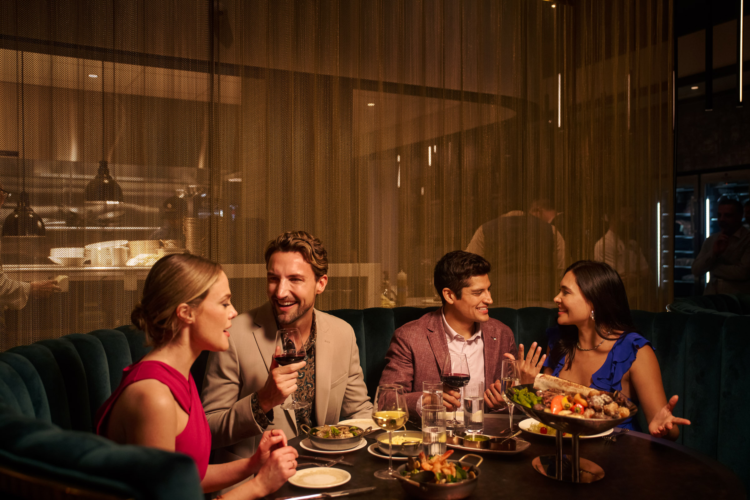 A group of people enjoying a dining experience.