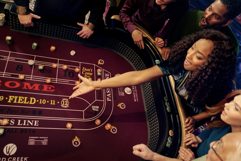 woman throwing dice at craps table