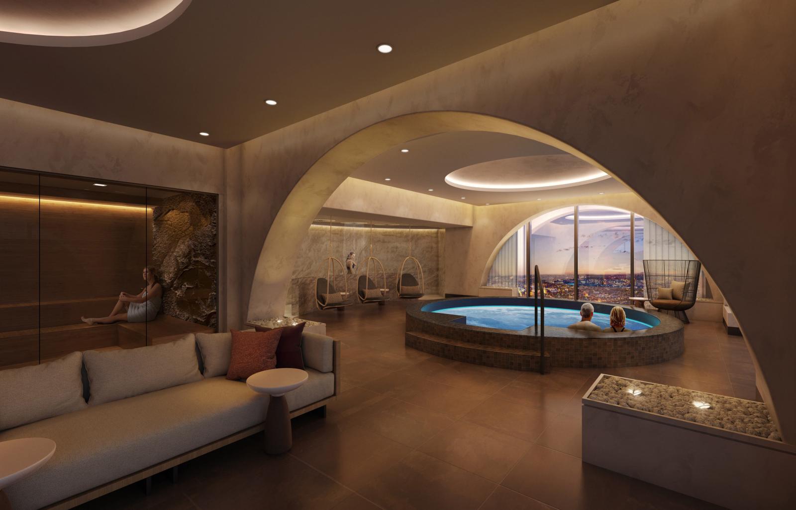 View of the spa lounge with a glass enclosed sauna, circular hot tub, and a view of the city. 