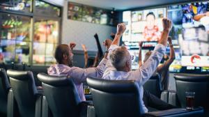 People Cheering at a Sportsbook